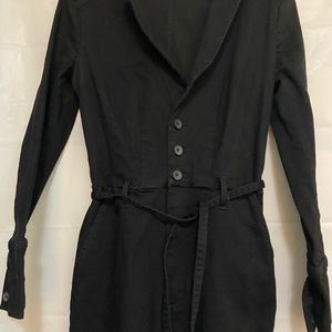 Free People black Lon sleeved Calico jumpsuit. sZ S